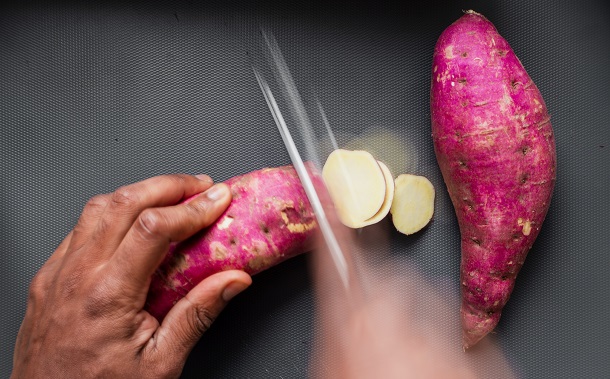 cutting sweet potato