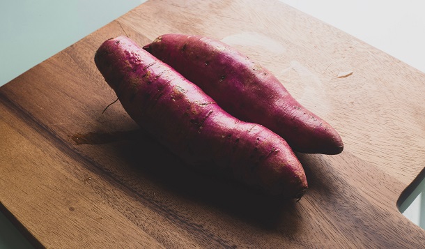 sweet potato on cutting board