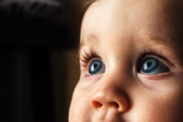 a baby with blue eyes