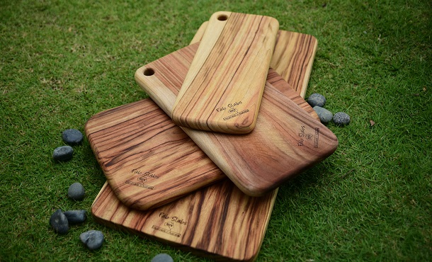 many wooden cutting boards